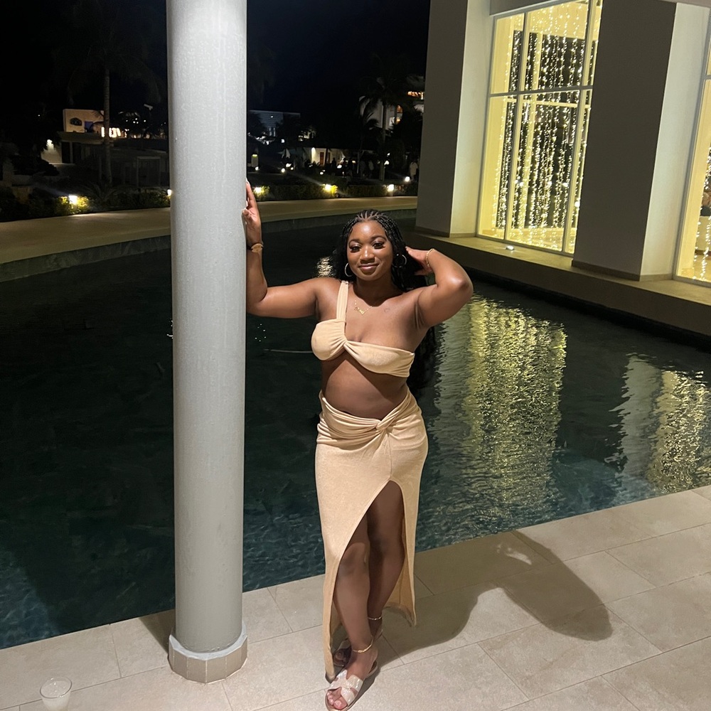 Beige two piece one shoulder crop top and skirt set